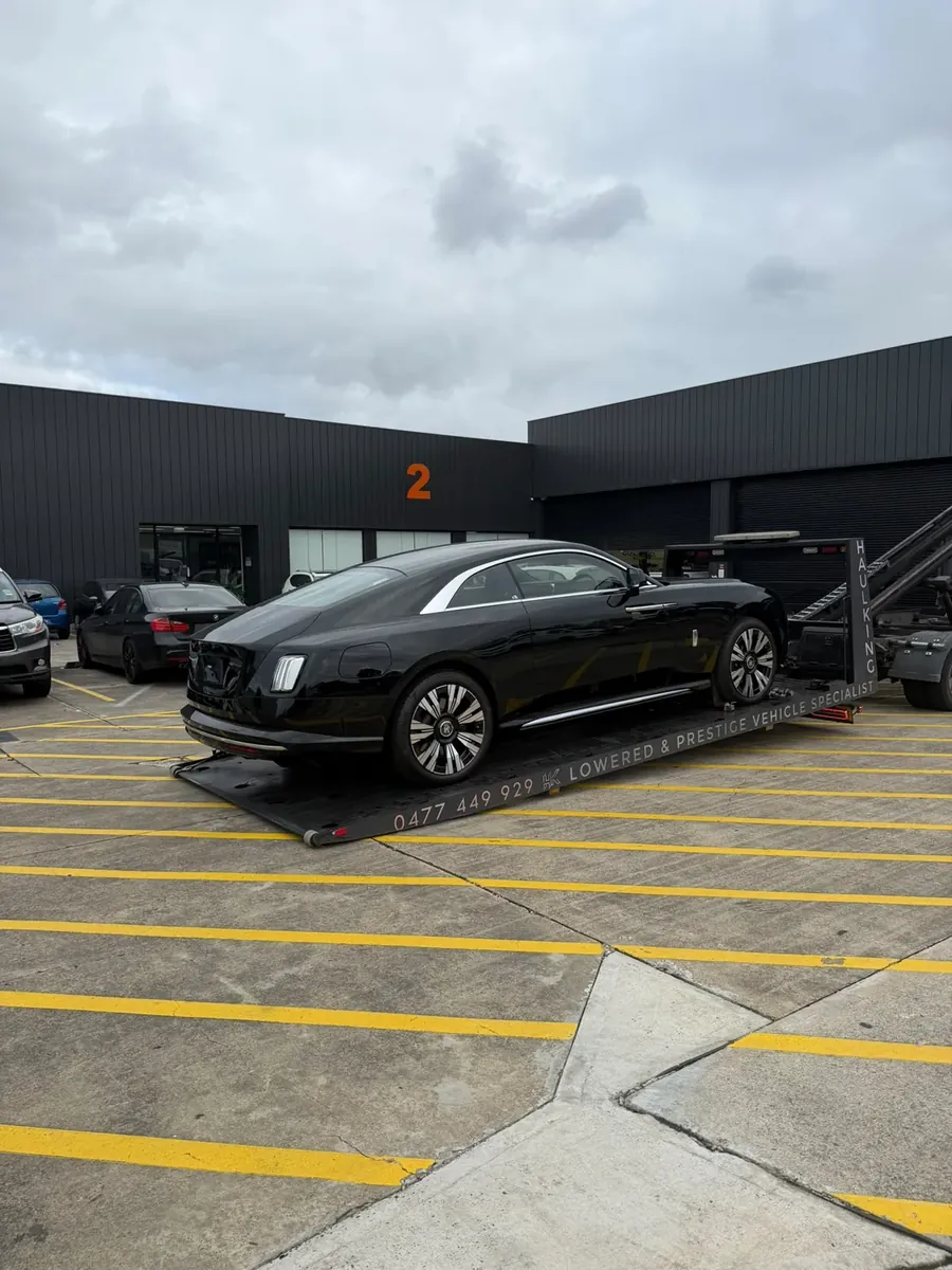 Rolls-Royce Spectre transported by Haul King