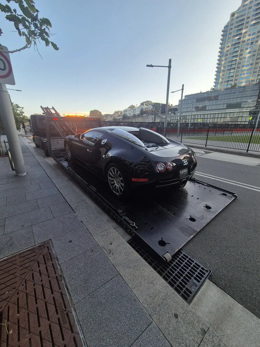Bugatti Veyron transported by Haul King